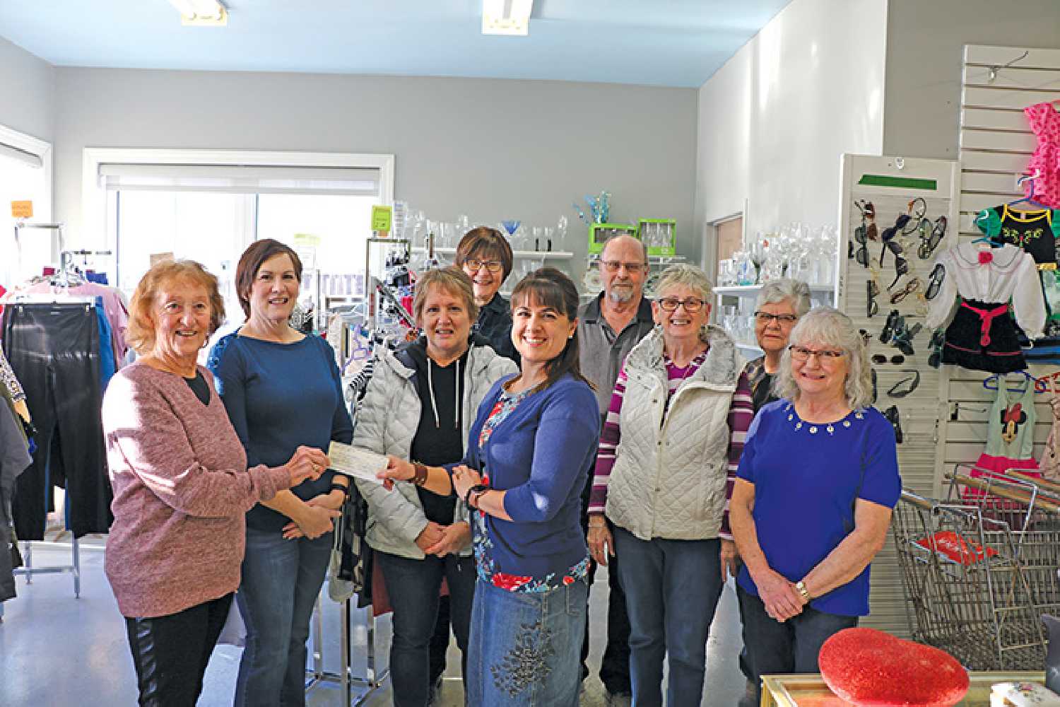 The board of the Rocanville Thrift Store donated $10,000 to the Moosomin and District Health Care Foundation for the CT Scanner. From left are Linda Bock and Gaylene Danielson of the Thrift store, Wendy Lynd and Melissa Ruhland of the Health Care Foundation, and Vivian Sveinbjornson, Percy Callin, Jean Howie, Joyce Surridge, and Denise Callin of the Thrift Store. 